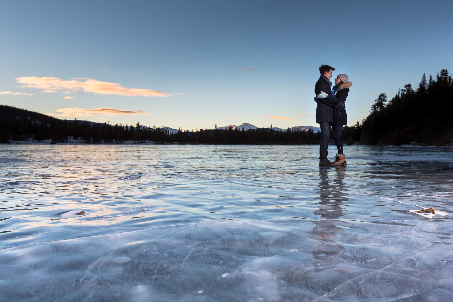 frozen lake colorado winter engagement photos