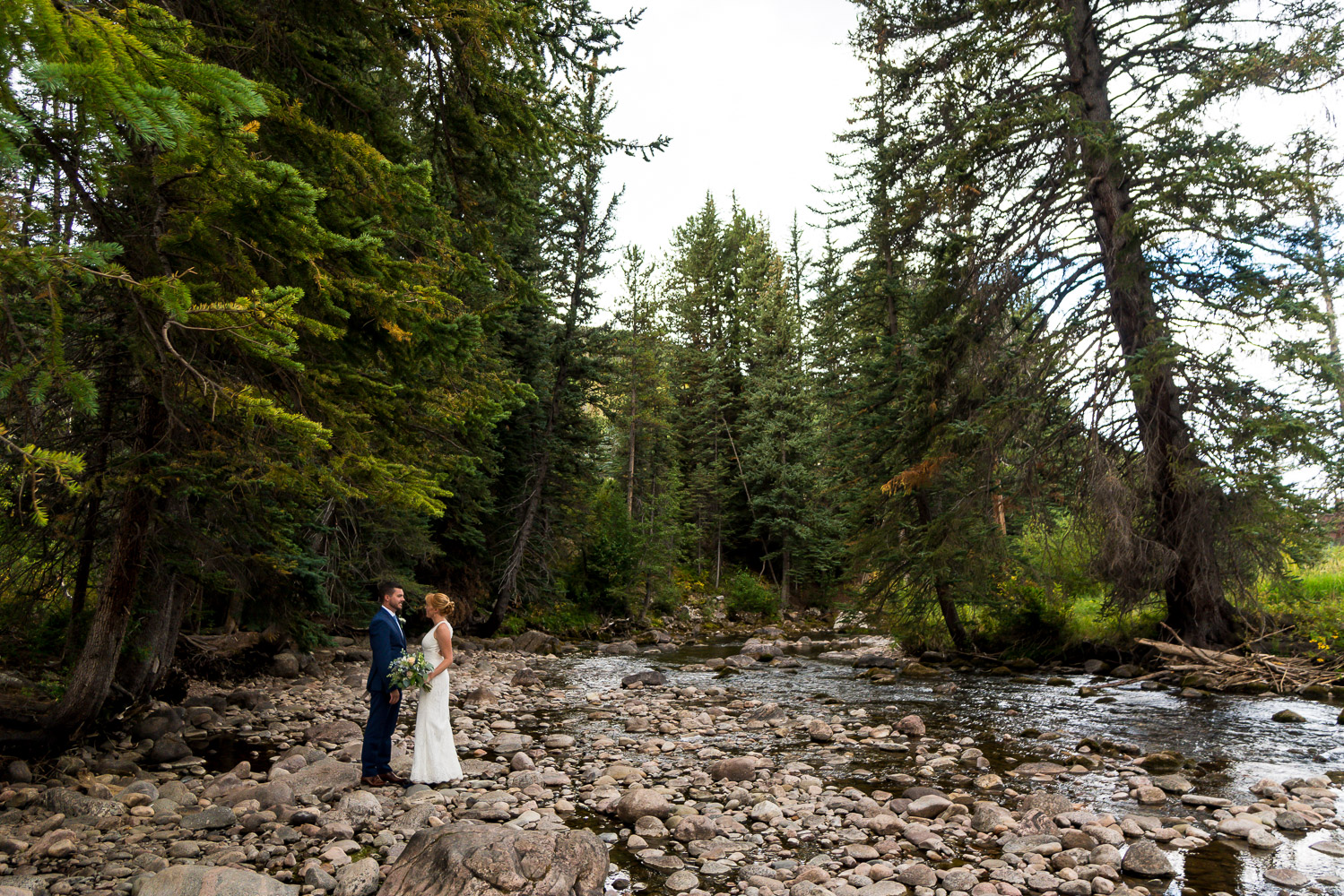 Vail Wedding Couple Portraits by Creek
