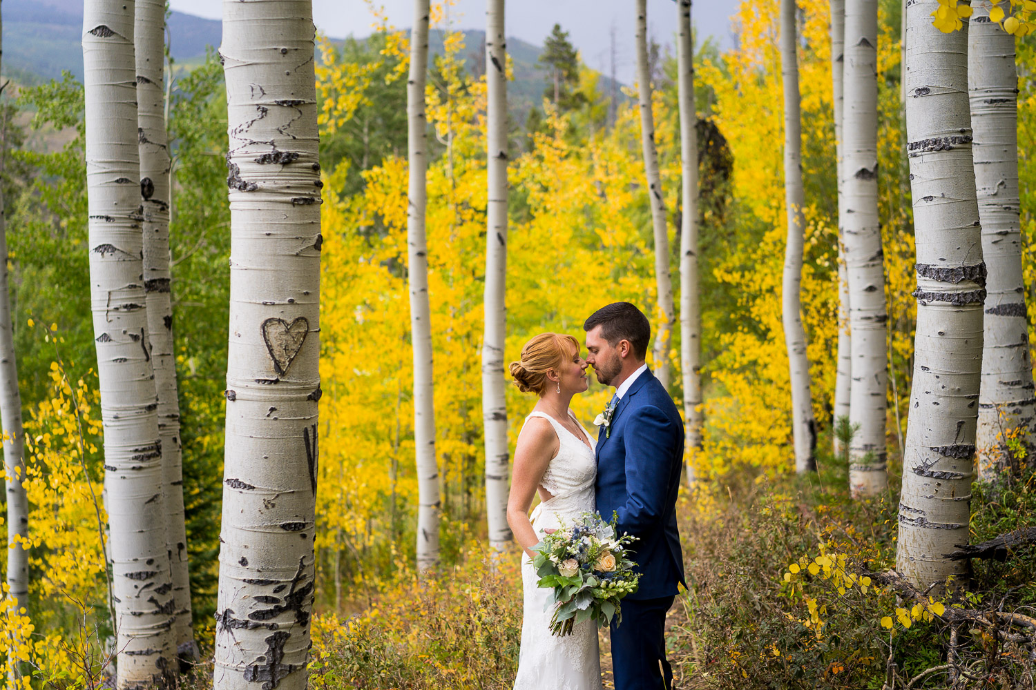 Vail Wedding Deck Fall Couple Portraits in Aspen Trees | Vail wedding photographers