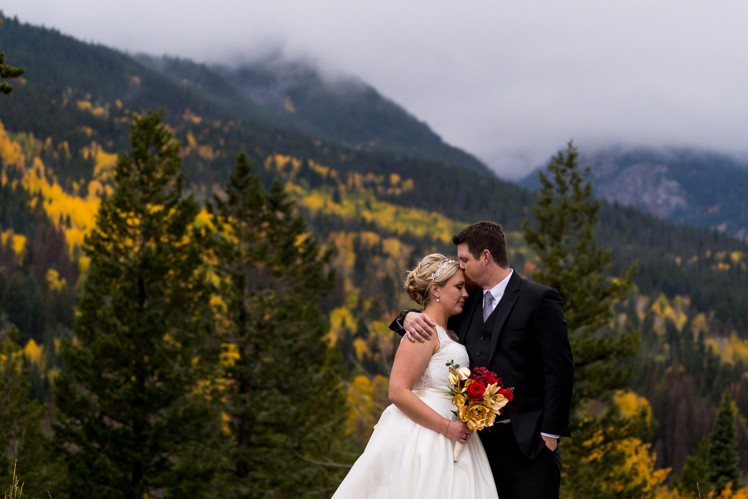 Black Canyon Inn Wedding with Portraits in Rocky Mountain National Park with peak fall colors