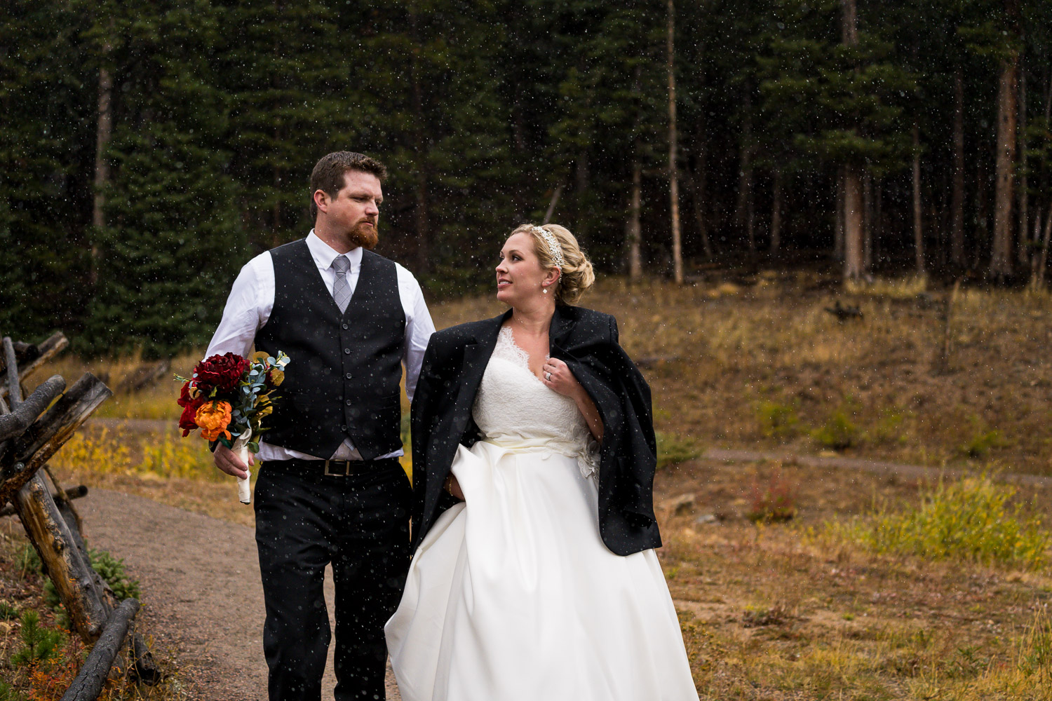 Black Canyon Inn Wedding with Portraits in Rocky Mountain National Park with foggy snow