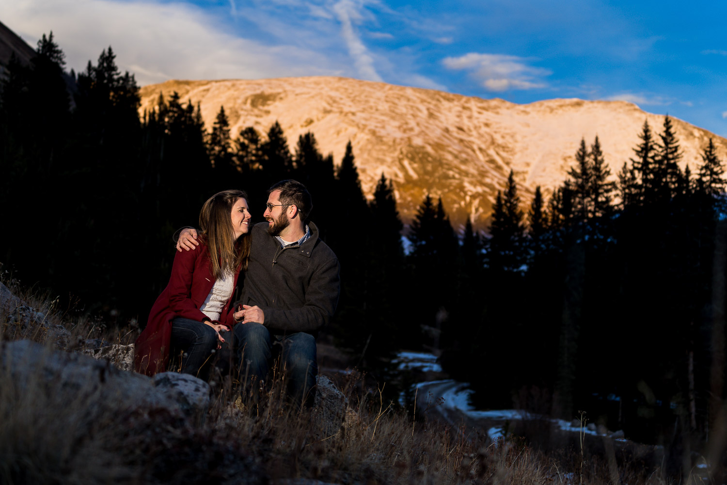 Colorado Mountain Engagement Photos with mountain backdrop