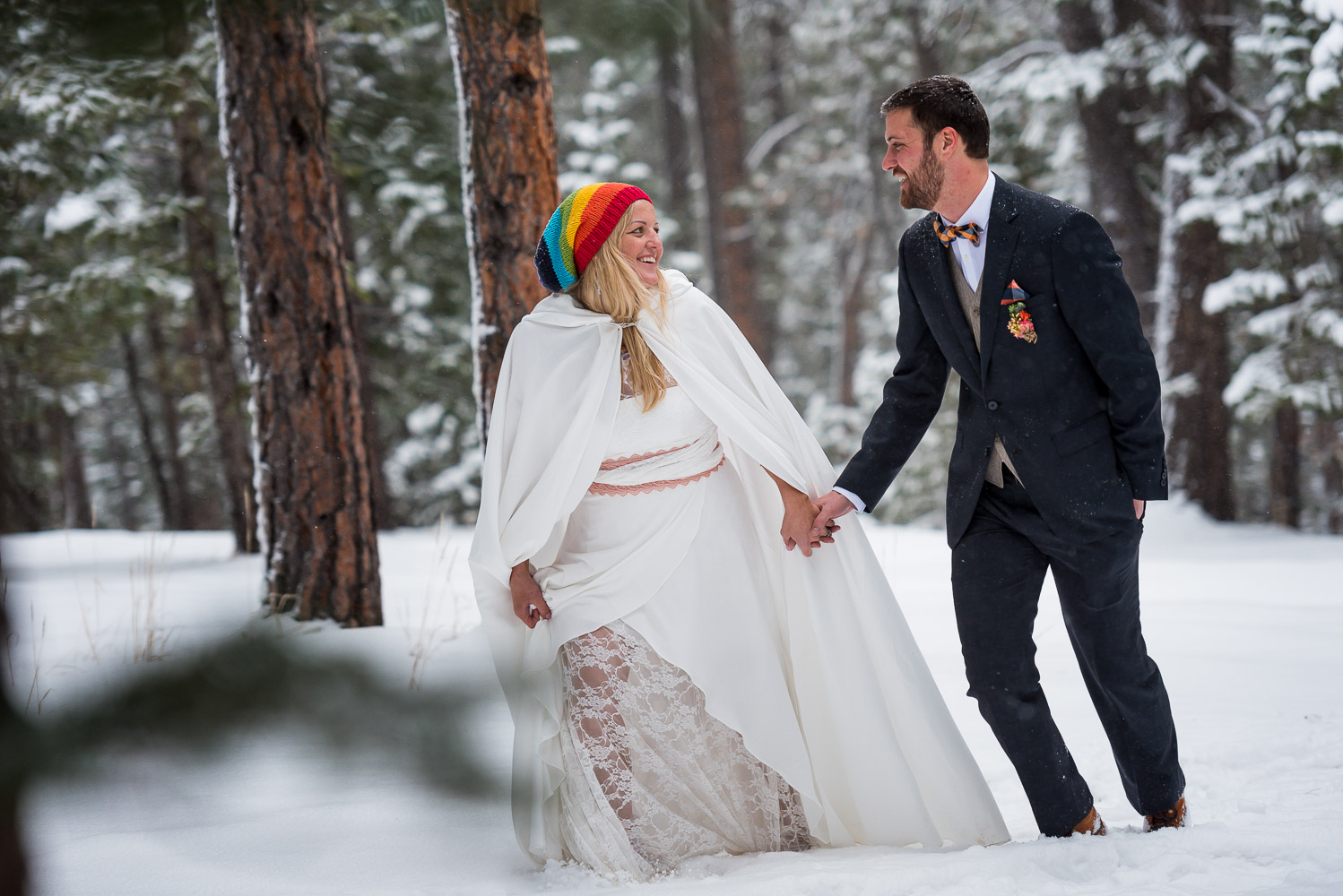 Sunshine mountain lodge winter wedding snowy couple portraits