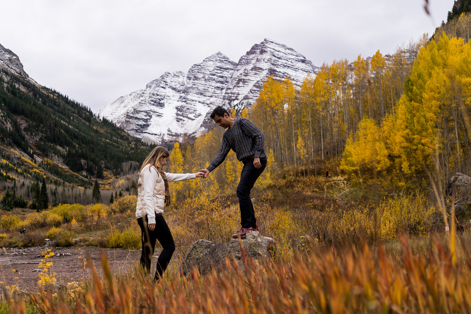 Maroon Bells Engagement Photos fall color snowy mountains