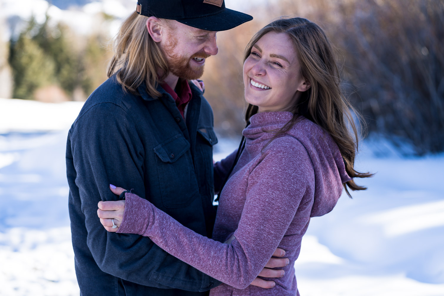 winter colorado engagement photos by river