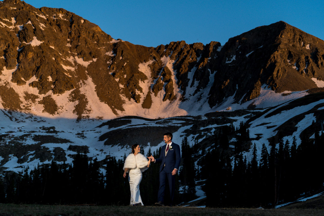 A Basin Adventure Wedding Photography Black Mountain Lodge Bride and Groom Sunset Alpenglow Colorado Mountain Wedding venue with Mountain views