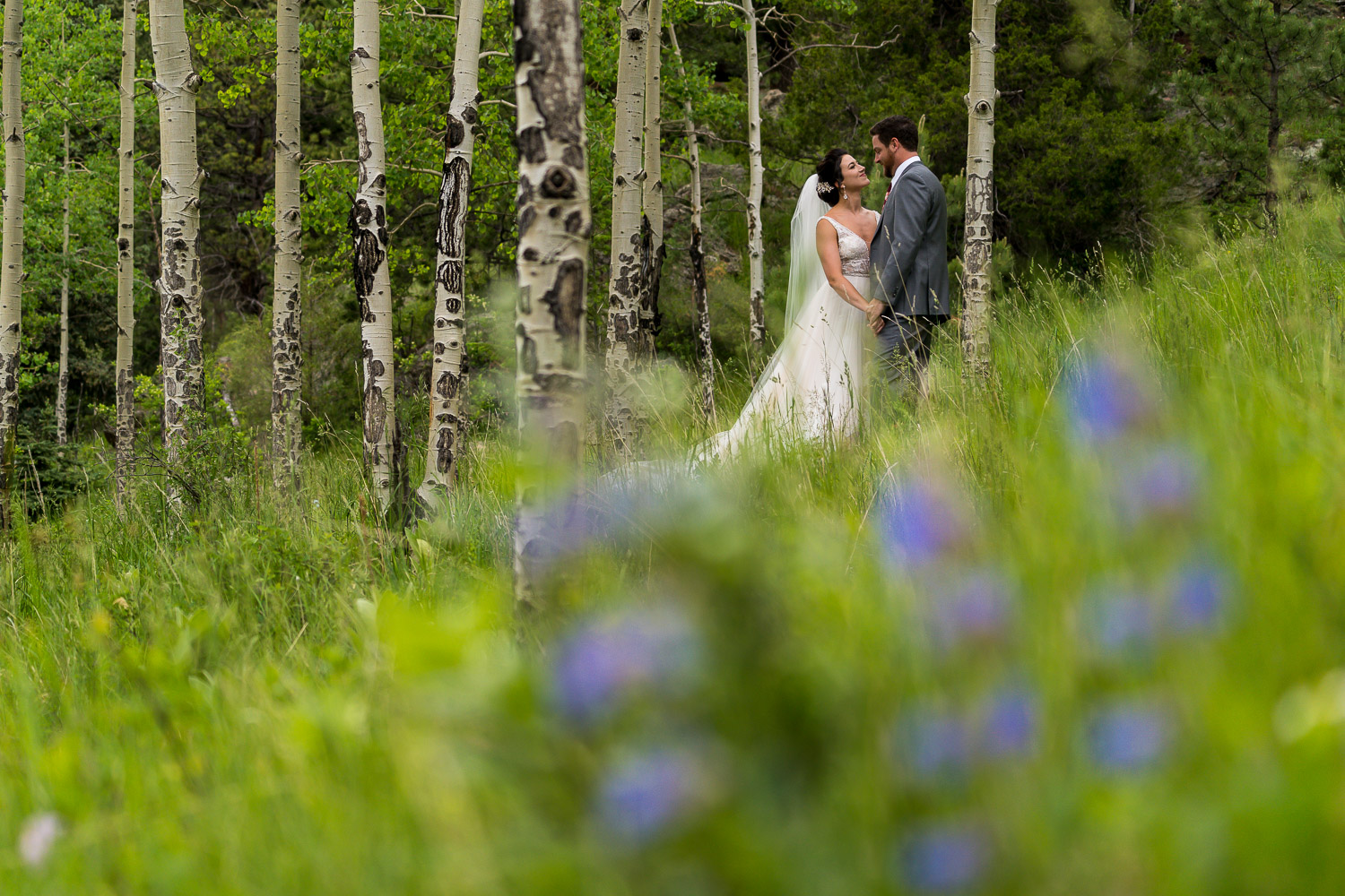 Evergreen Lake House Colorado Wedding Photos Bride and Groom Flowers