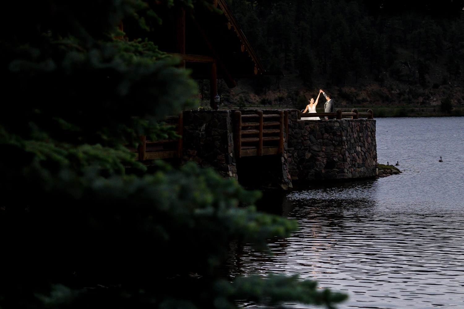 Evergreen Lake House Colorado Wedding Photos Bride and Groom by the Lake