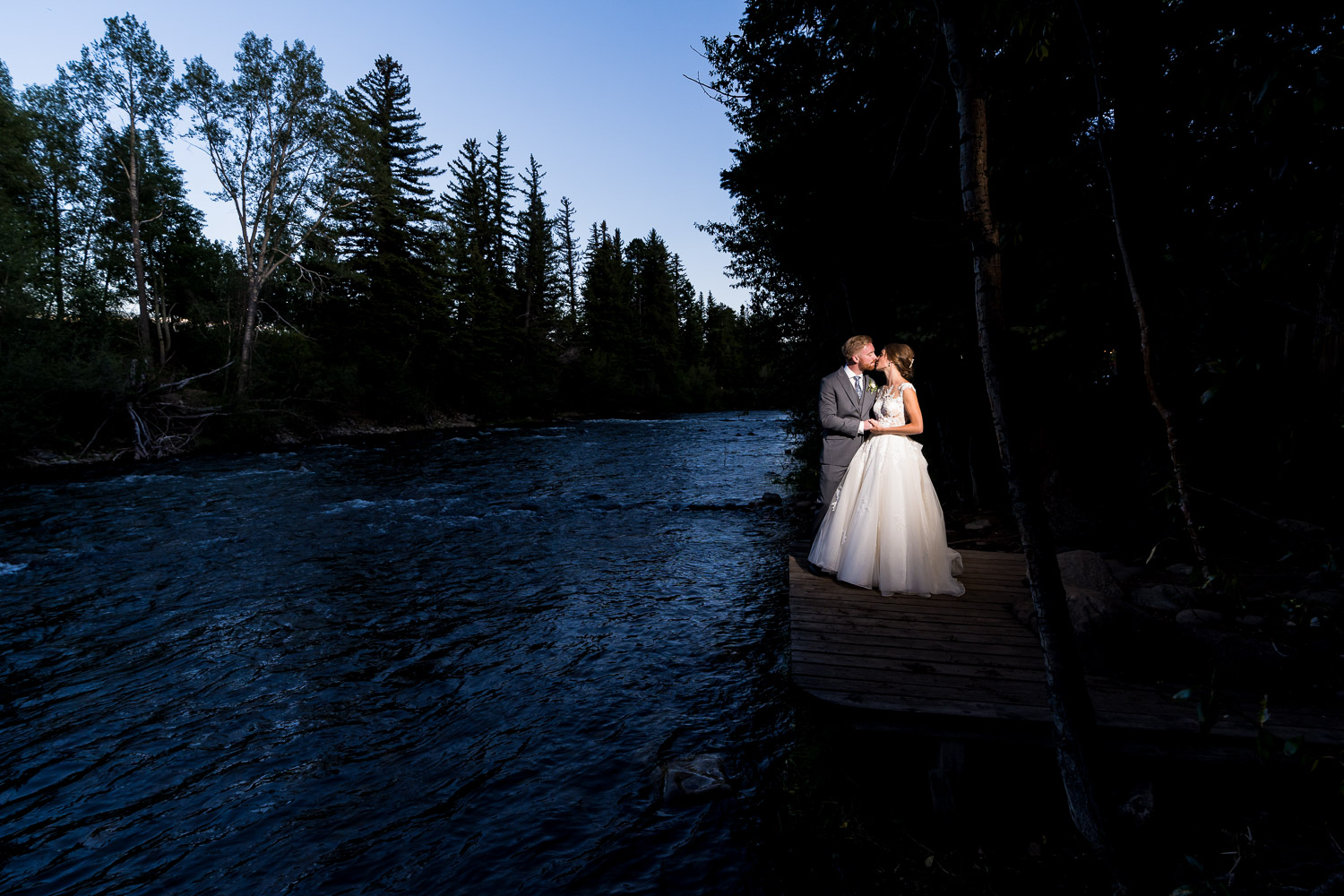 Silverthorne Pavillion Wedding Bride and Groom by the river