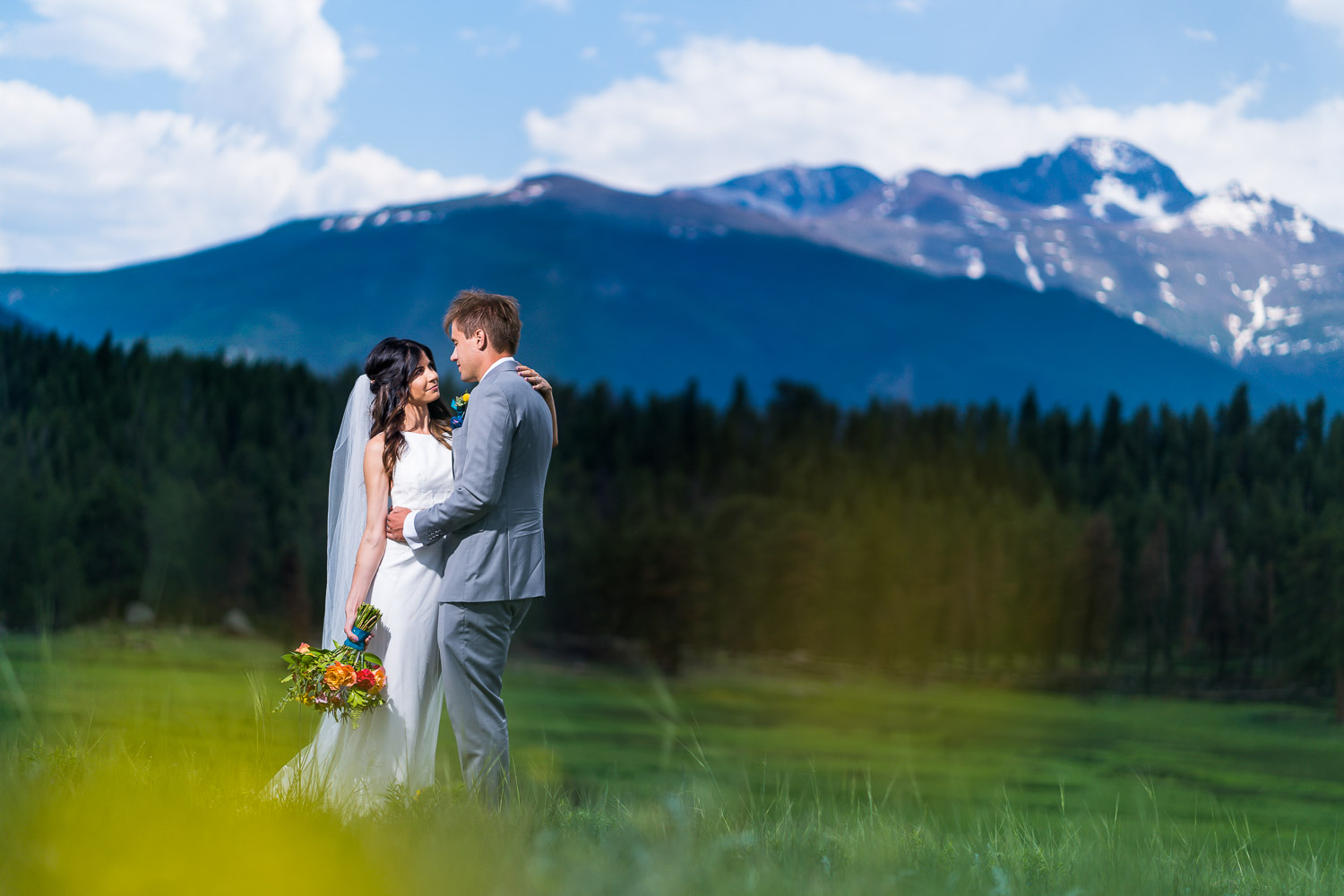 elope in estes park in summer with flowers