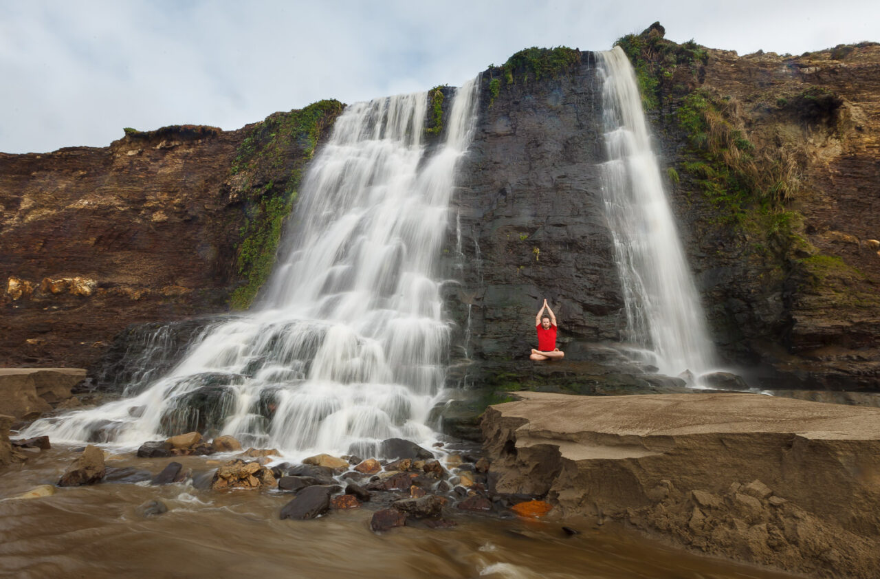 how to meditate for increased creative thinking - meditating by a waterfall