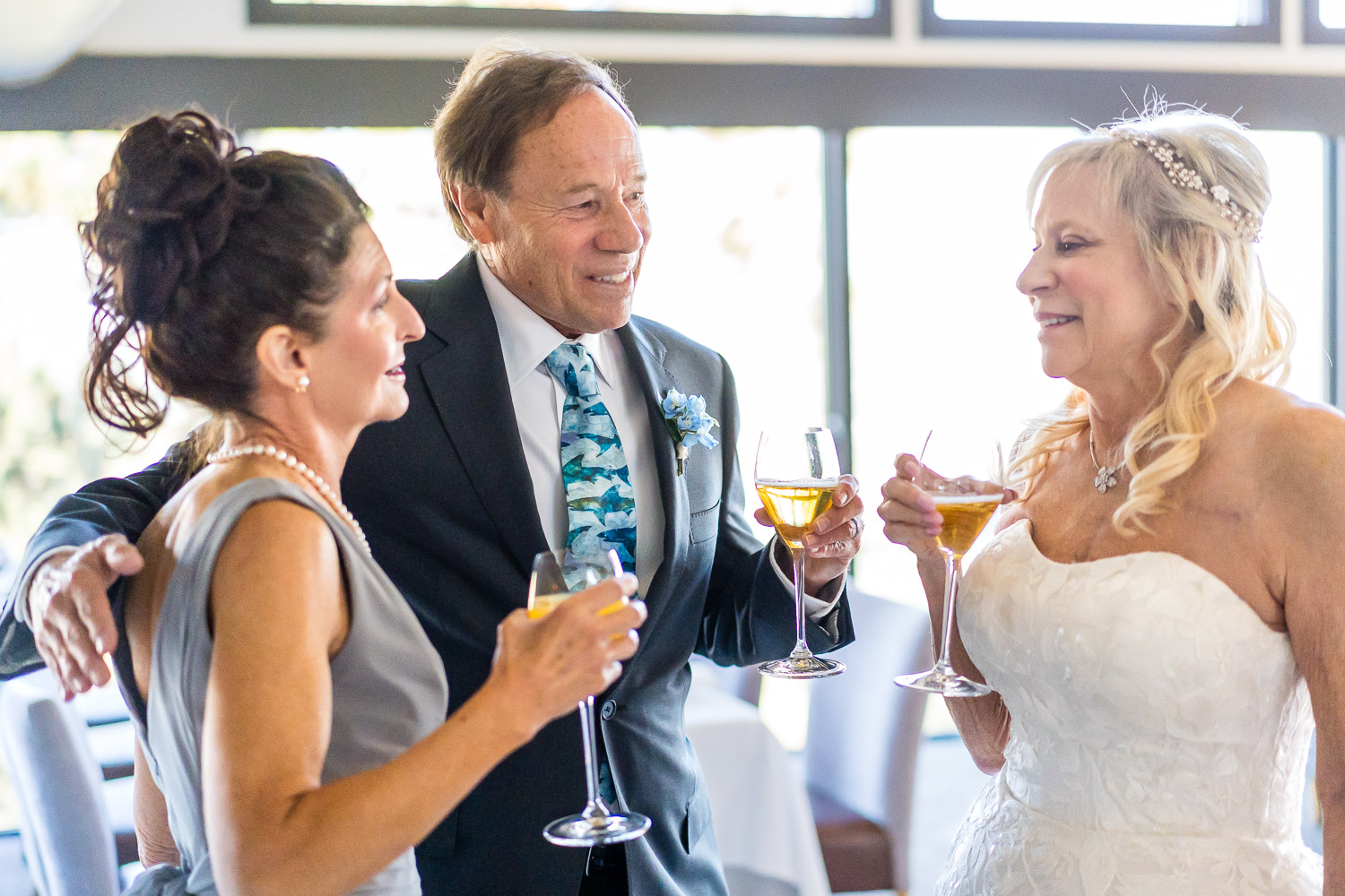 bride and groom toasting during flagstaff restaurant wedding